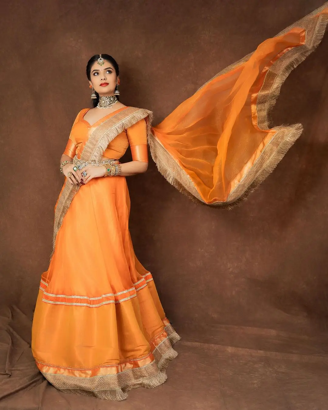 ETV Actress Sreemukhi in Orange Lehenga Blue Choli